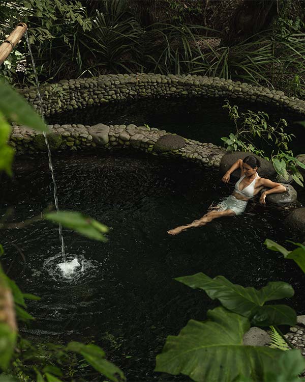 Bambu Indah Riverside Yoga Shala — open-air bamboo structure above the Ayung River, Ubud